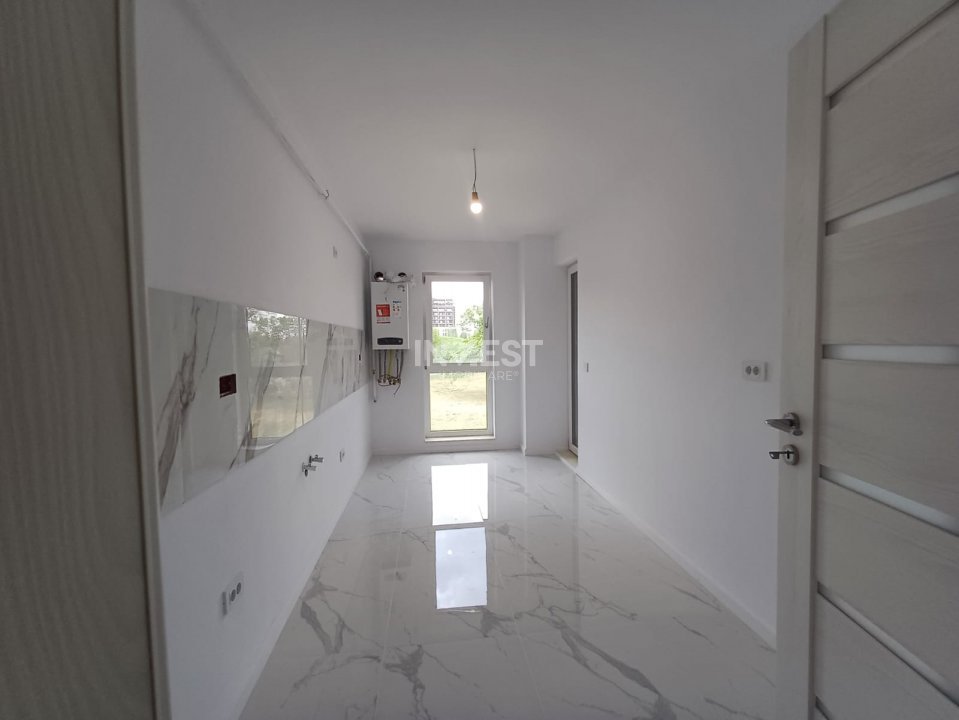 APARTAMENT CU 2 CAMERE , DECOMANDAT , NICOLINA-CUG BLOC NOU - 2